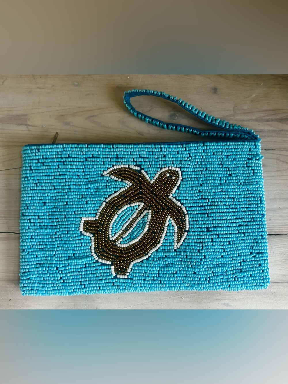 Beaded blue with Sea Turtle image wristlet zippered pouch.